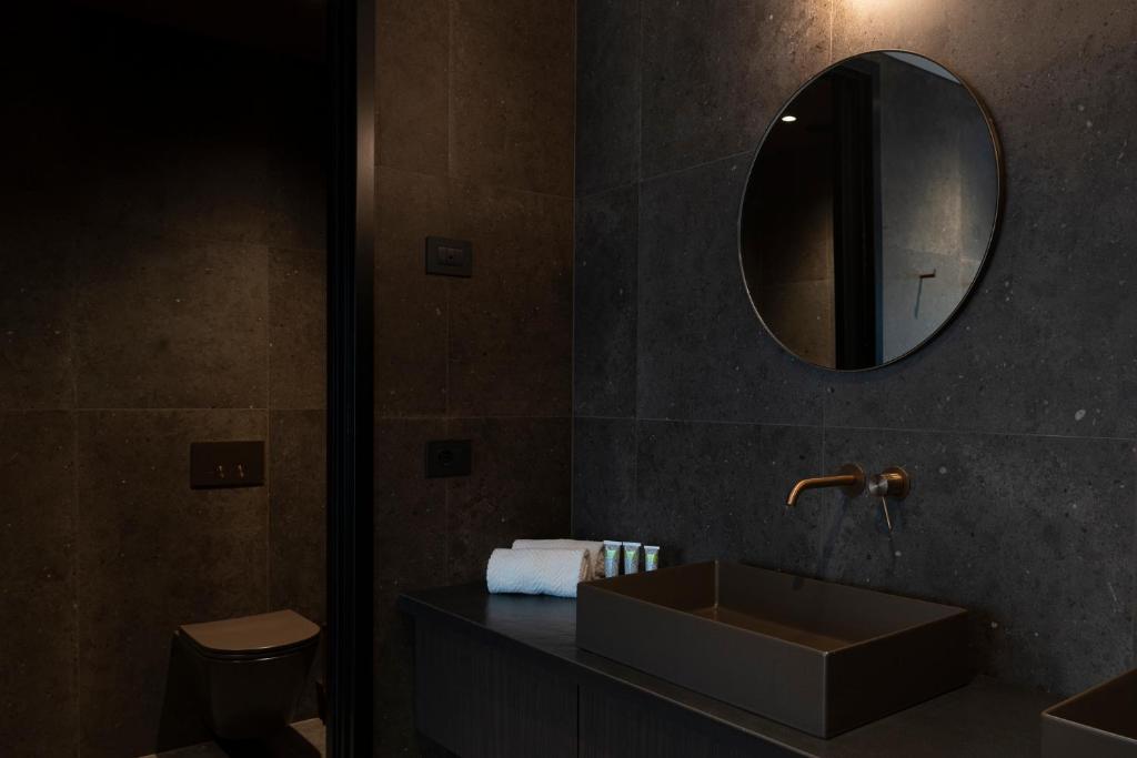 Koupelna v ubytování Le Fucine Hotel