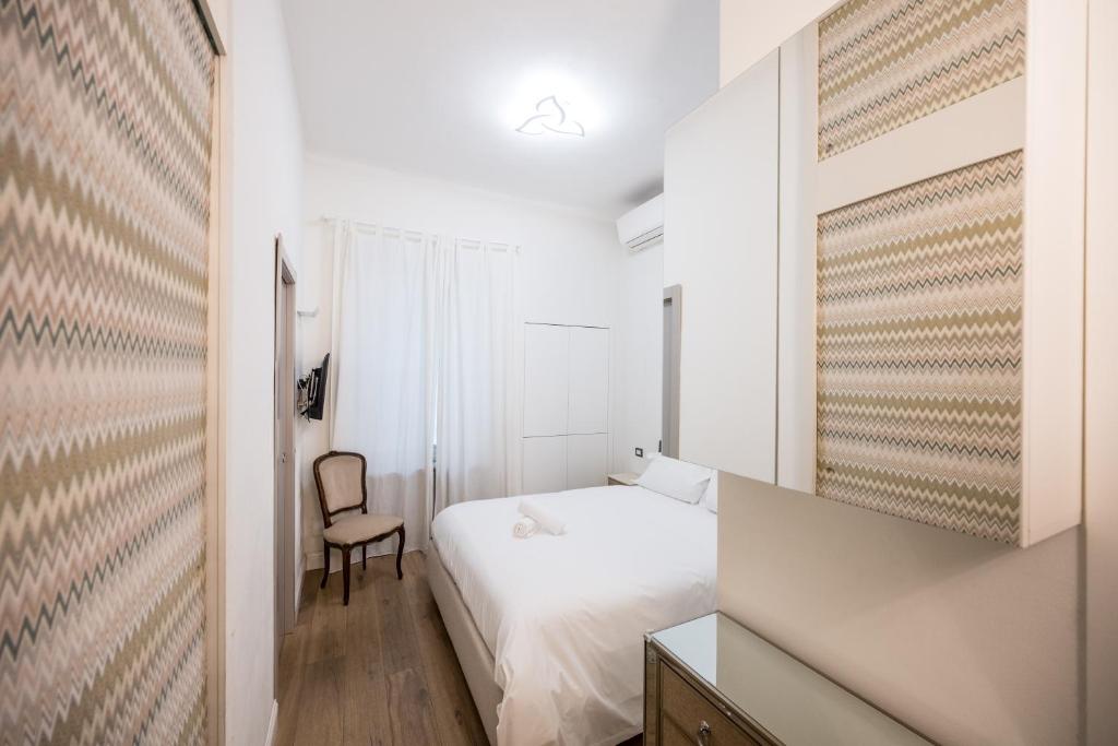 Postel nebo postele na pokoji v ubytování ShortMi Borsieri