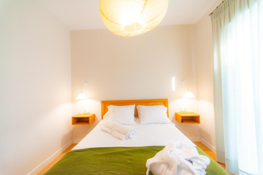 Postel nebo postele na pokoji v ubytování Casa San Mateo
