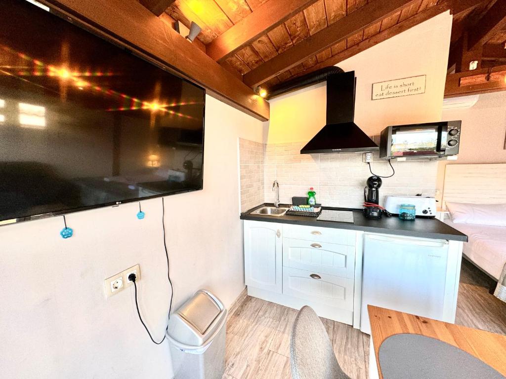Kuchyňa alebo kuchynka v ubytovaní 3 Casita-Estudio con Jardín en la playa
