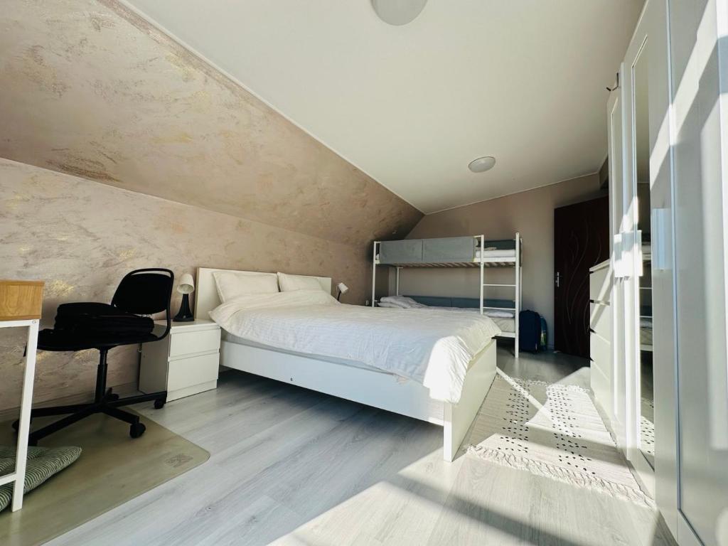 Postel nebo postele na pokoji v ubytování Sky Hills Apartment