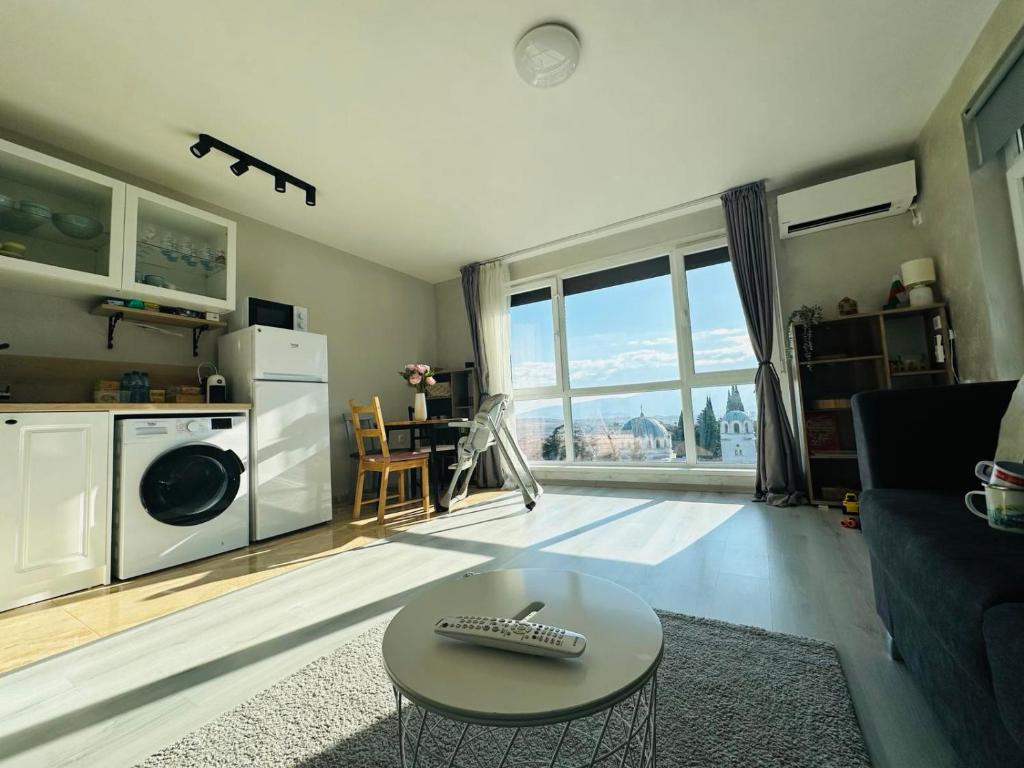 Kuchyň nebo kuchyňský kout v ubytování Sky Hills Apartment