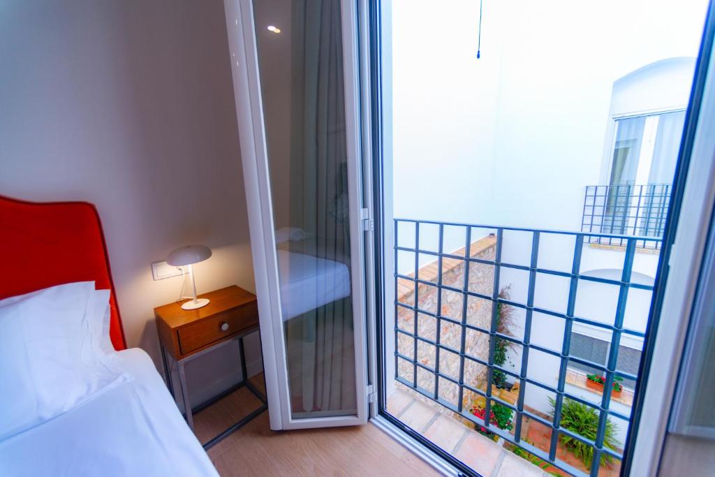 Postel nebo postele na pokoji v ubytování Casa San Mateo