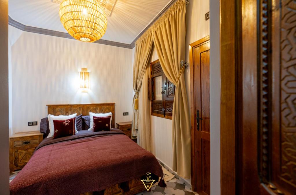 Postel nebo postele na pokoji v ubytování Riad Village