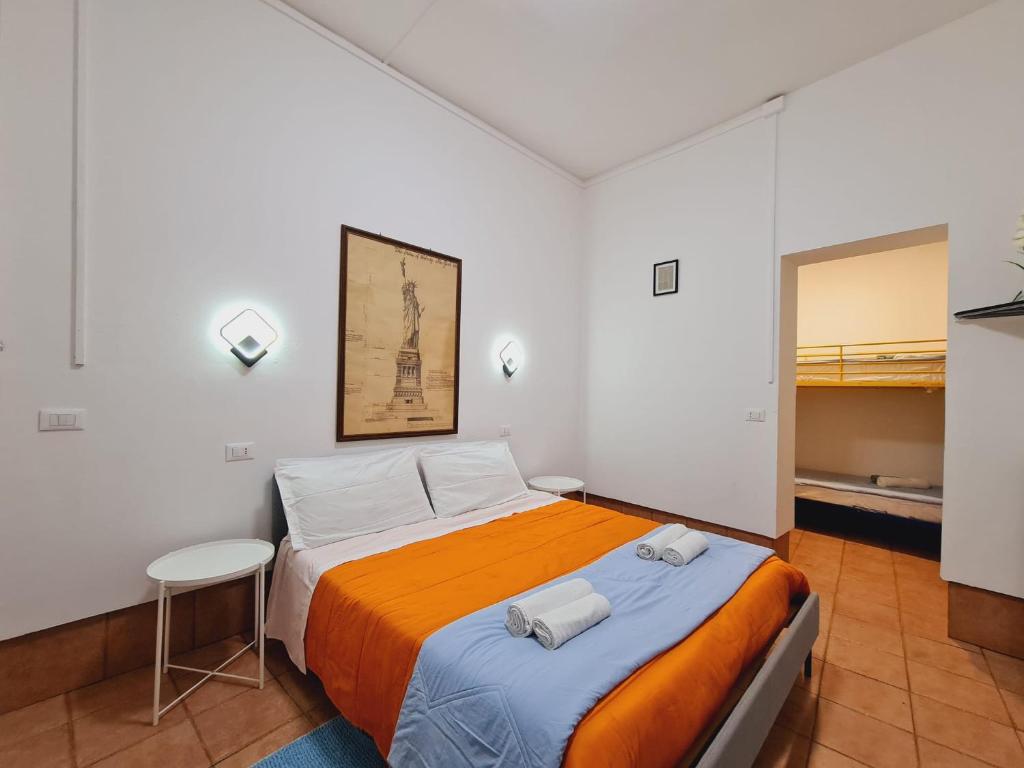 Ένα ή περισσότερα κρεβάτια σε δωμάτιο στο Pavarotti