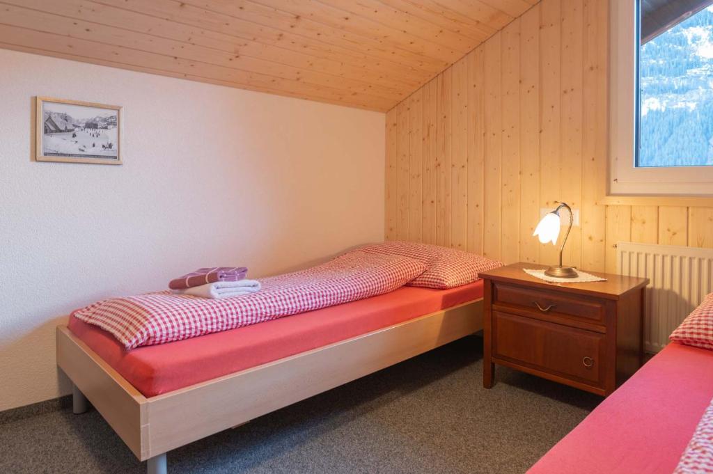 Postel nebo postele na pokoji v ubytování Lehmann's Herberge Hostel