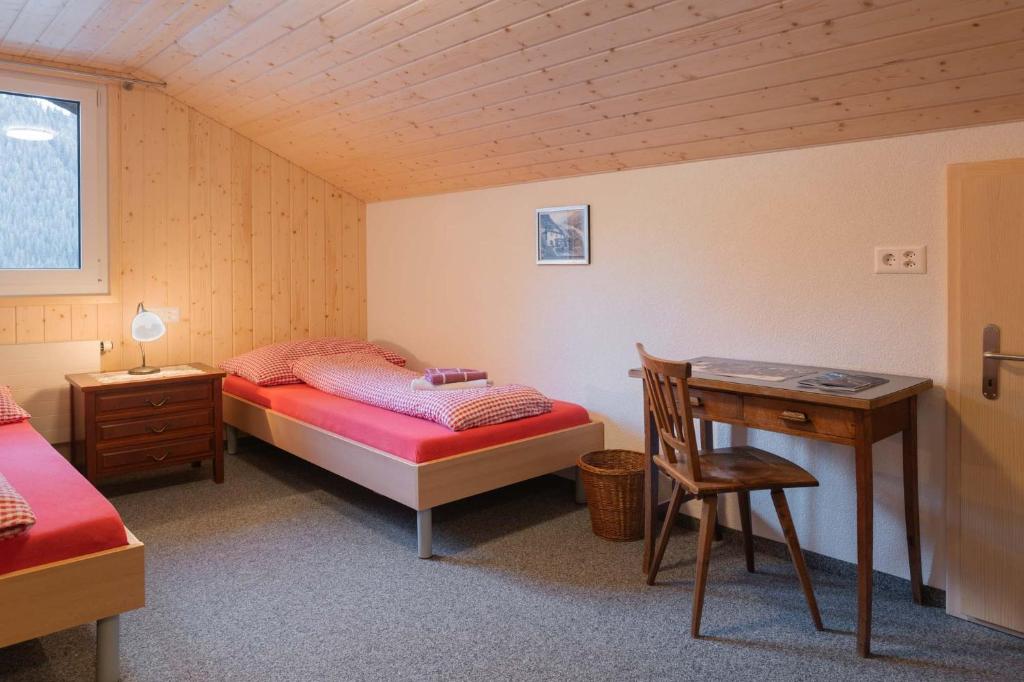 Postel nebo postele na pokoji v ubytování Lehmann's Herberge Hostel