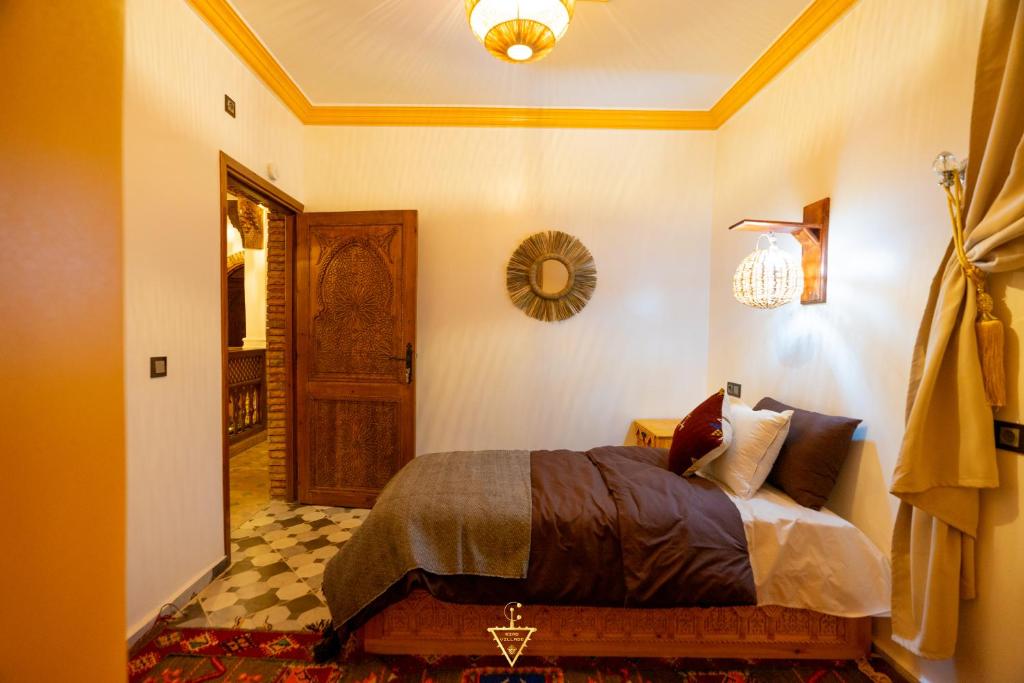 Postel nebo postele na pokoji v ubytování Riad Village