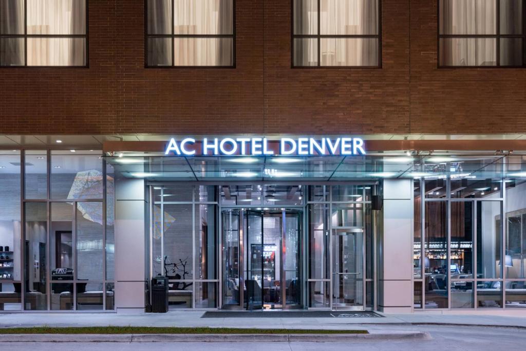 a building with a hotel denver sign on it at AC Hotel by Marriott Denver Downtown in Denver