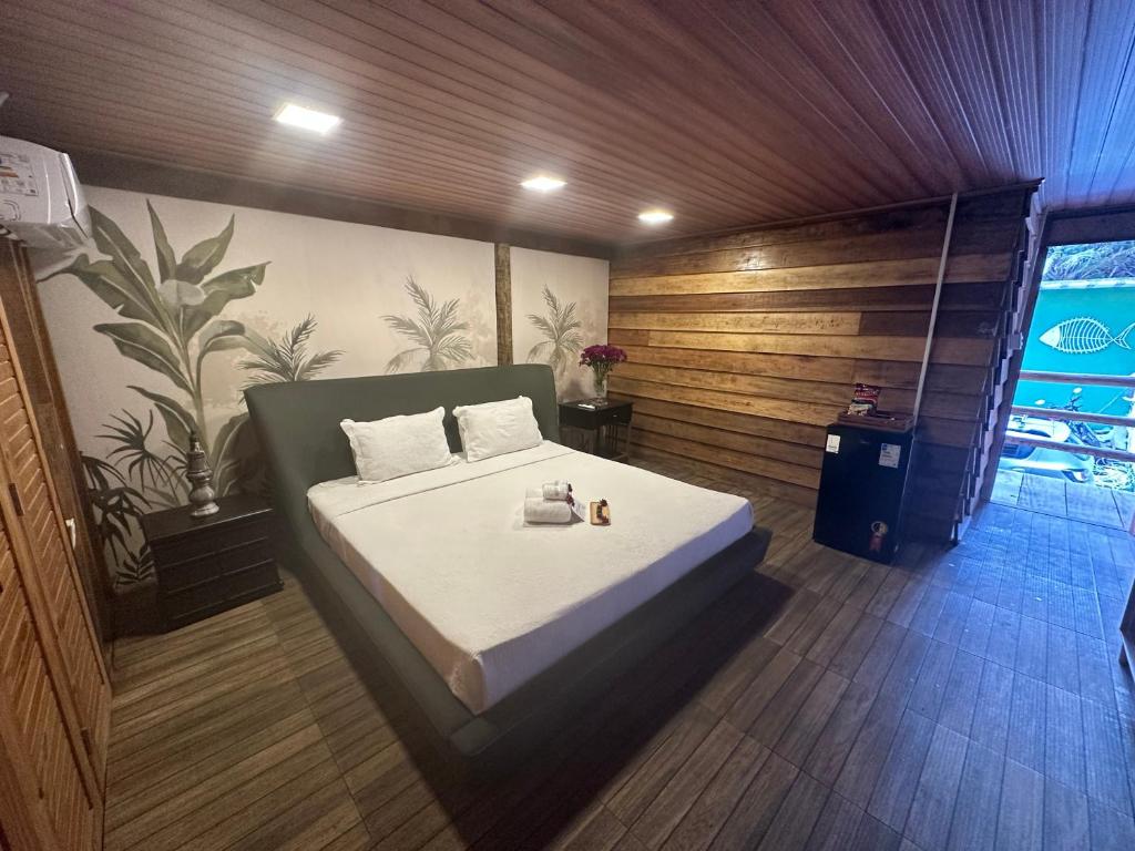 Postel nebo postele na pokoji v ubytování Pousada Beach House Coqueirinho