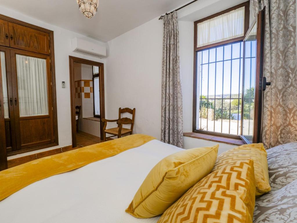 Posteľ alebo postele v izbe v ubytovaní Cubo's Hacienda El Baldio