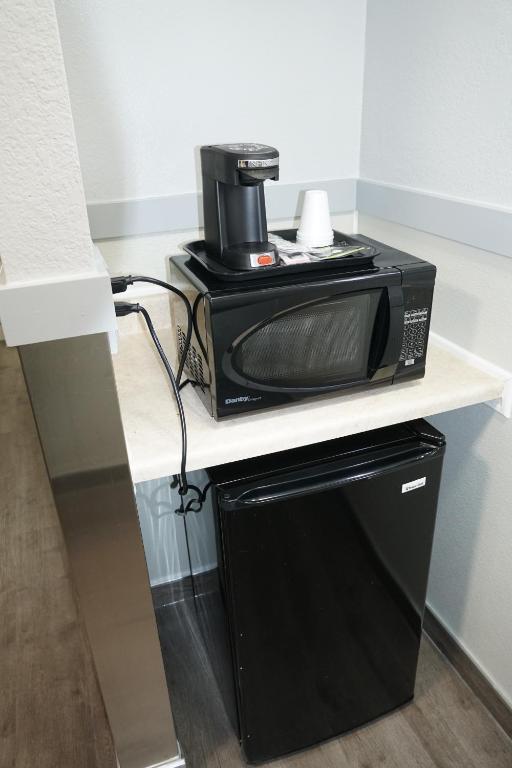 Kuchyň nebo kuchyňský kout v ubytování Best Motel