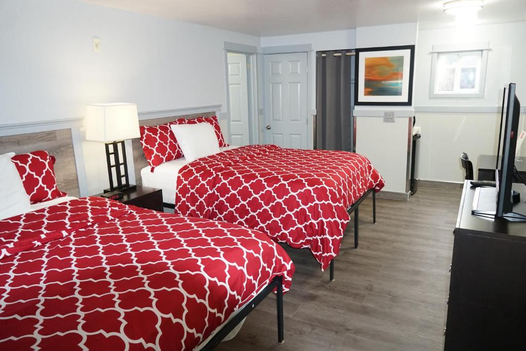 Postel nebo postele na pokoji v ubytování Best Motel