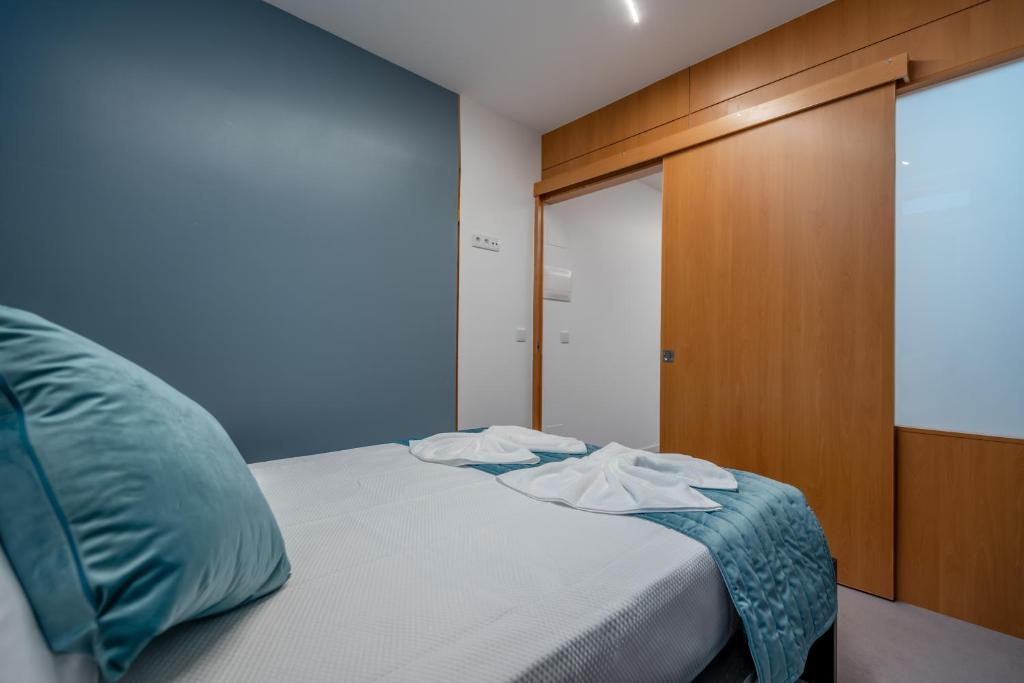 מיטה או מיטות בחדר ב-Social Lodge - Piornais