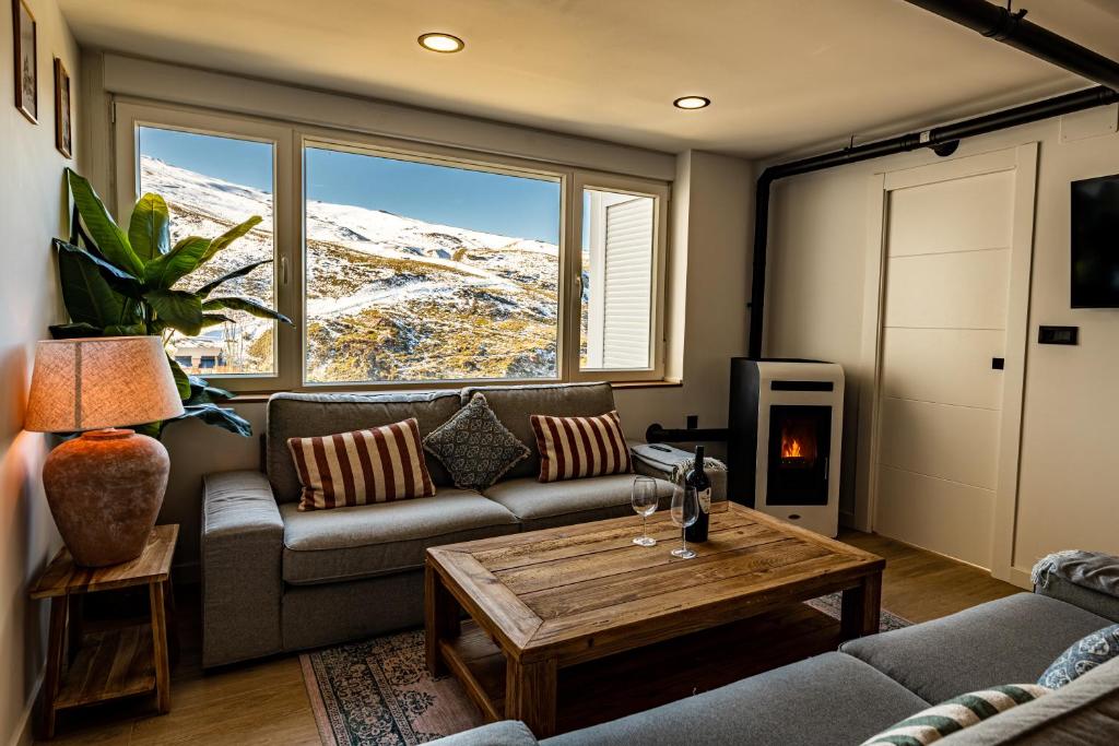 Χώρος καθιστικού στο Luxury refurnished apartment with Private Parking close to ski slopes