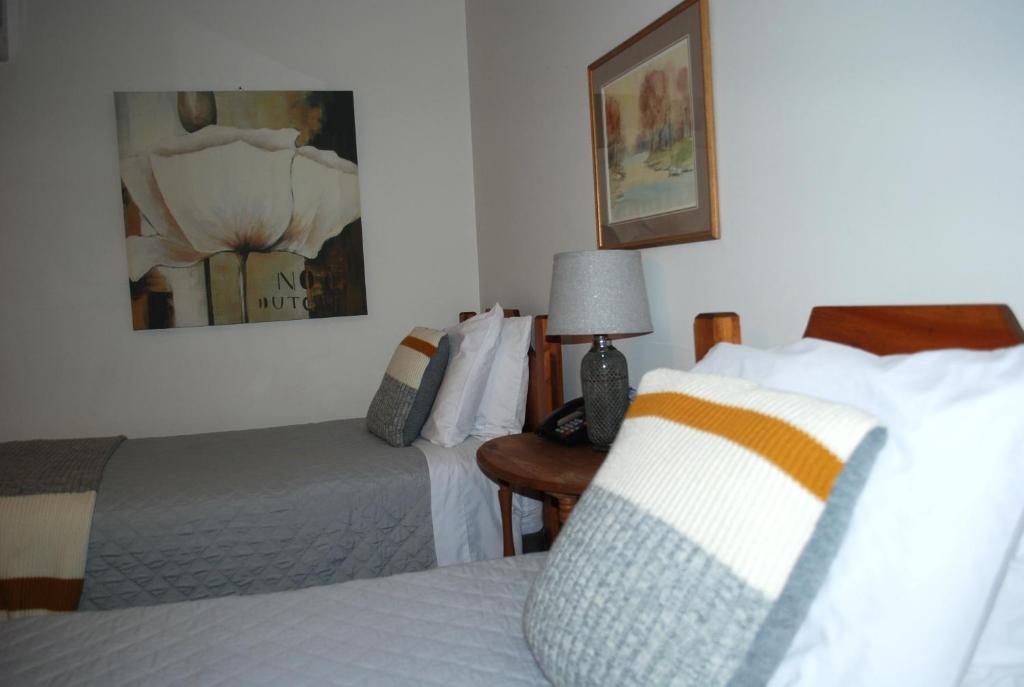 Postel nebo postele na pokoji v ubytování AUBERGE Knowlton