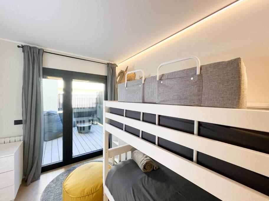 Posezení v ubytování Ático Dúplex De Lujo - CLASIFICACIÓN 5 ESTRELLAS - 8PAX - A Pie Del Centro - 2 PARKINGS l by BonesVacances