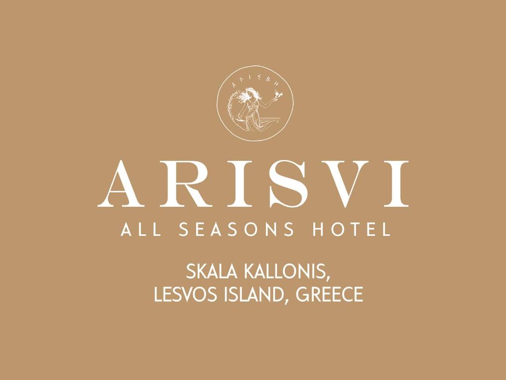 un cartel con el nombre de un hotel de todas las estaciones en Arisvi All Seasons Hotel en Skala Kallonis