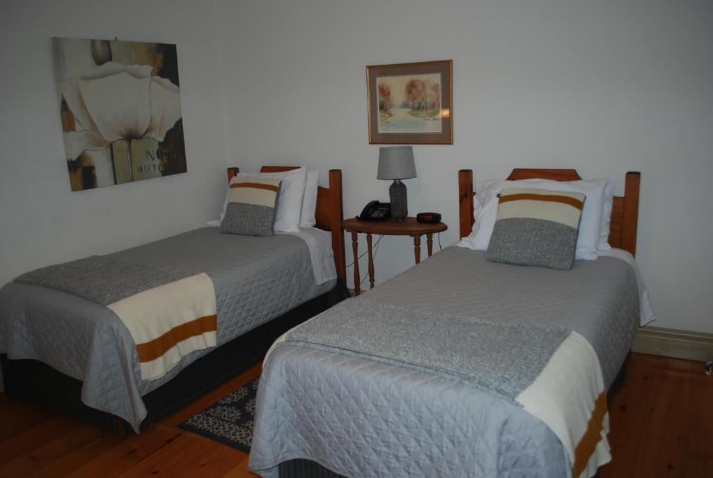 Postel nebo postele na pokoji v ubytování AUBERGE Knowlton