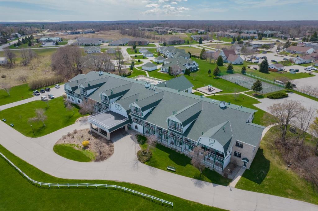 an aerial view of a large house with a large yard at Birchwood Lodge in Sister Bay