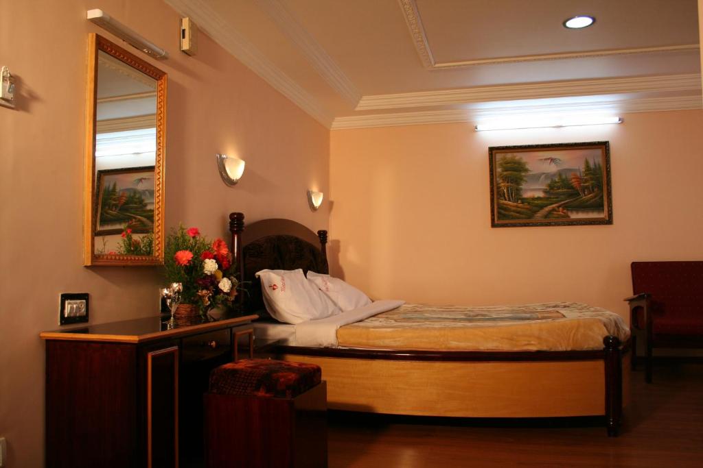 Postel nebo postele na pokoji v ubytování Hotel Mount View