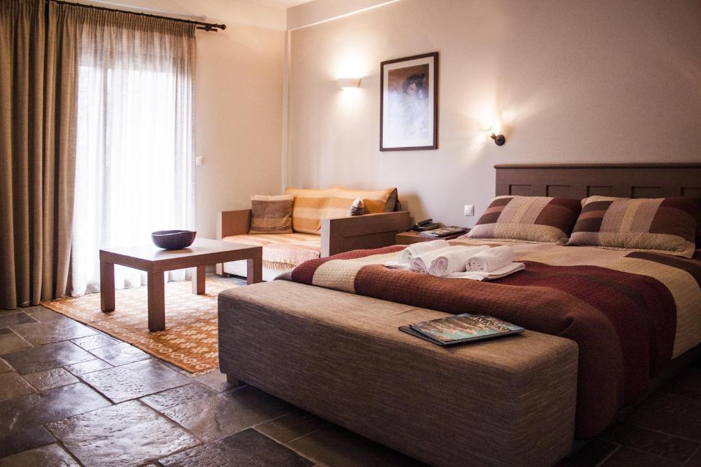 Postel nebo postele na pokoji v ubytování Guesthouse Vasiliki