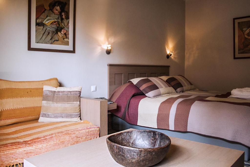 Postel nebo postele na pokoji v ubytování Guesthouse Vasiliki