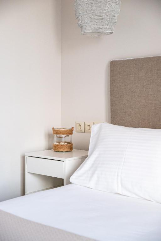 Postel nebo postele na pokoji v ubytování Cos Seafront Apartments