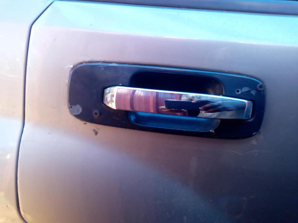 a car door with a carabiner on it at Paradise Apartment One Bedroom Ensuite 