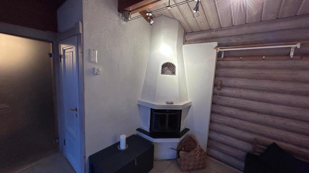 Fotografie z fotogalerie ubytování Laakson Helmi 2 ,separate sauna, fireplace, lake v destinaci Himos