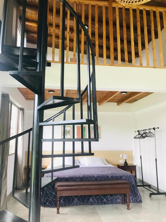 Postel nebo postele na pokoji v ubytování Las Cabañas