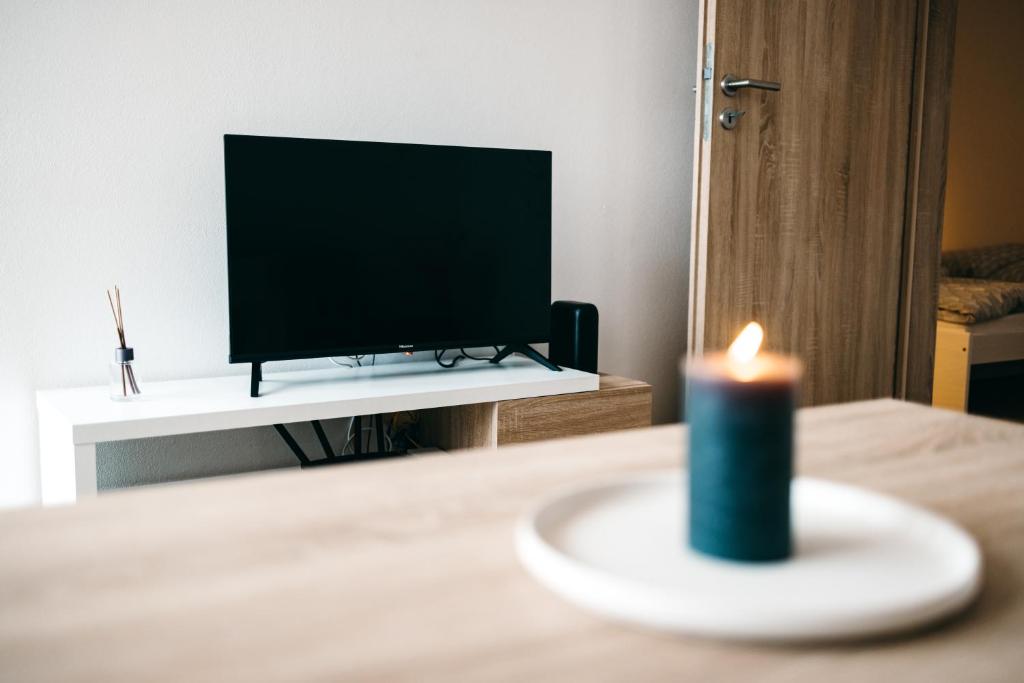 TV a/nebo společenská místnost v ubytování Byt 21 v Rezidenci Bílý lev na náměstí