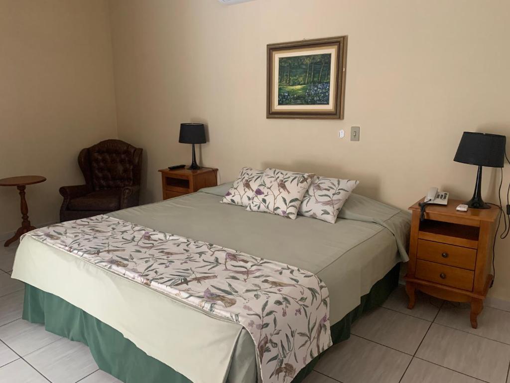 Postel nebo postele na pokoji v ubytování Hotel Formigas na Figueira