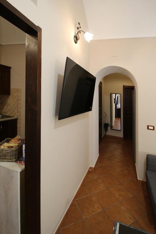 TV a/nebo společenská místnost v ubytování Casa 4 Archi