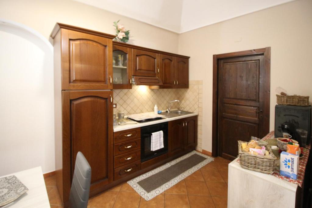 Kuchyň nebo kuchyňský kout v ubytování Casa 4 Archi