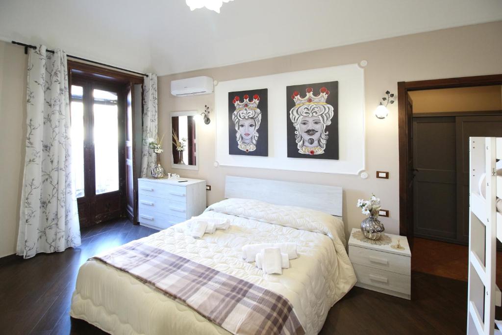 Postel nebo postele na pokoji v ubytování Casa 4 Archi