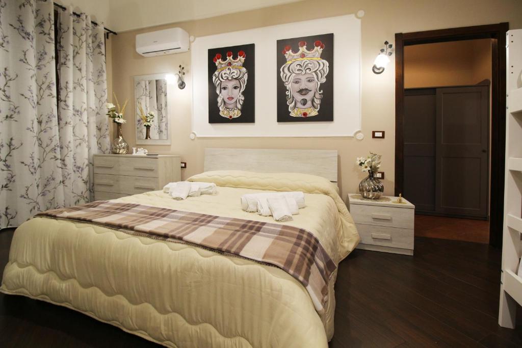 Postel nebo postele na pokoji v ubytování Casa 4 Archi