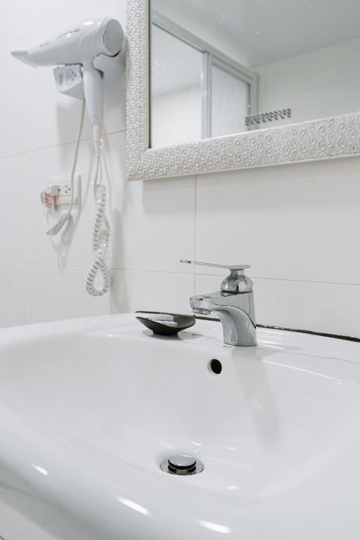 Koupelna v ubytování 歐法行旅 O Fun Hotel