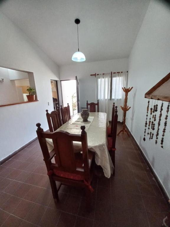 a dining room with a table and chairs at La Evelia in Salta