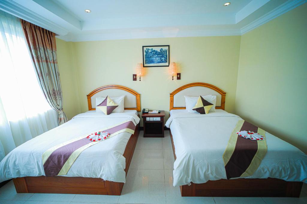 Postel nebo postele na pokoji v ubytování Classy Hotel & Spa