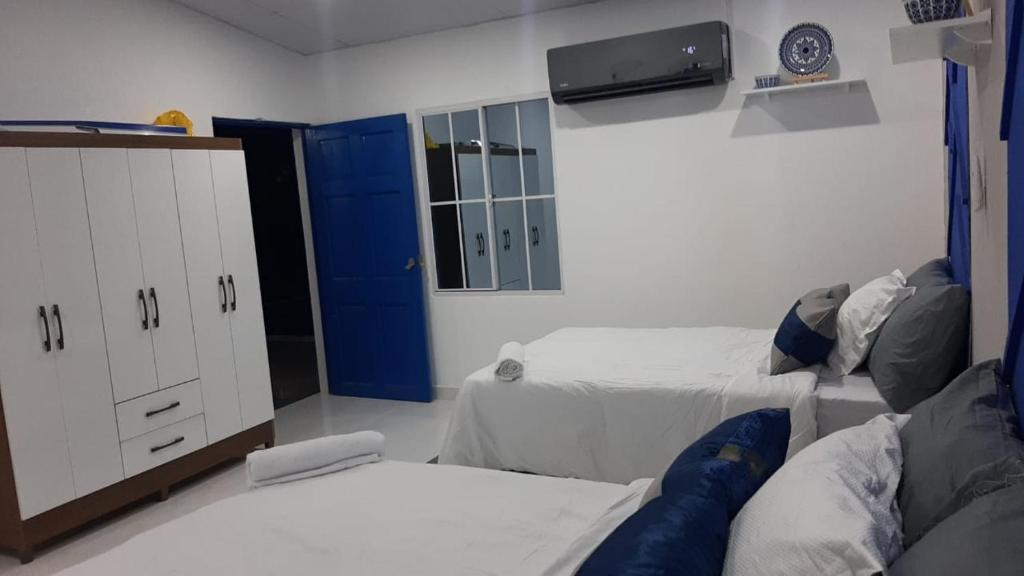 En eller flere senge i et værelse på RANCHO SARIMAR