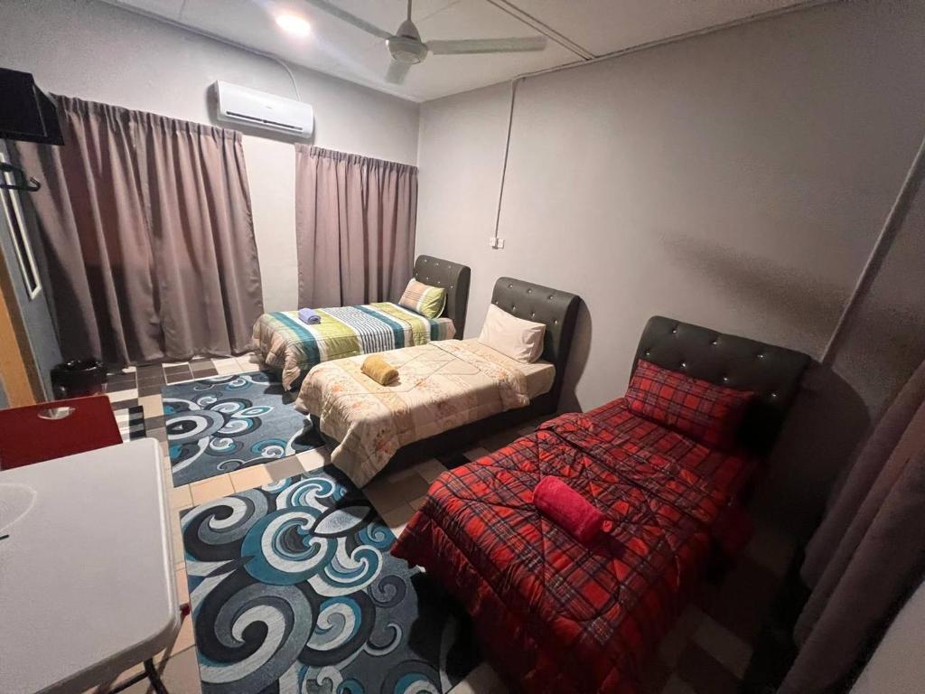 Putra Sentosa Retreat Camp, Sematan - Habitación Triple