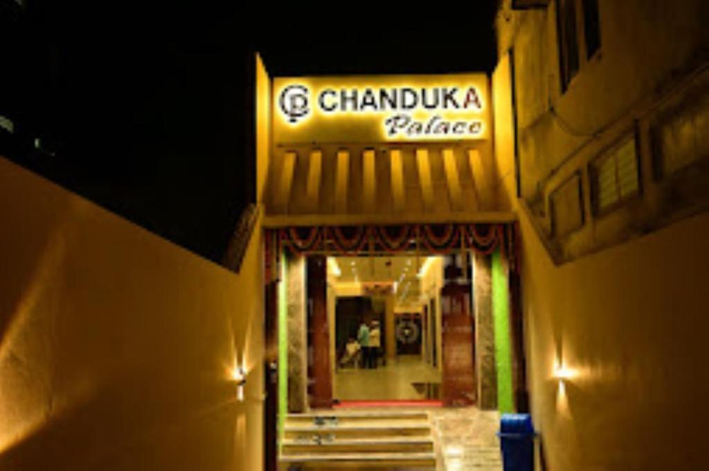 a building with a sign that reads chambukkaaza palace at Hotel Chanduka Palace , Puri in Puri