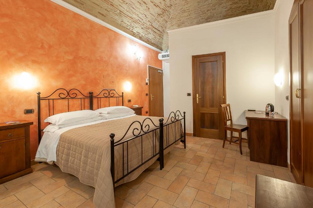Postel nebo postele na pokoji v ubytování Hotel Sole