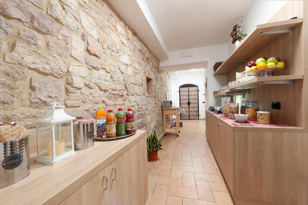 Kuchyň nebo kuchyňský kout v ubytování Hotel Sole