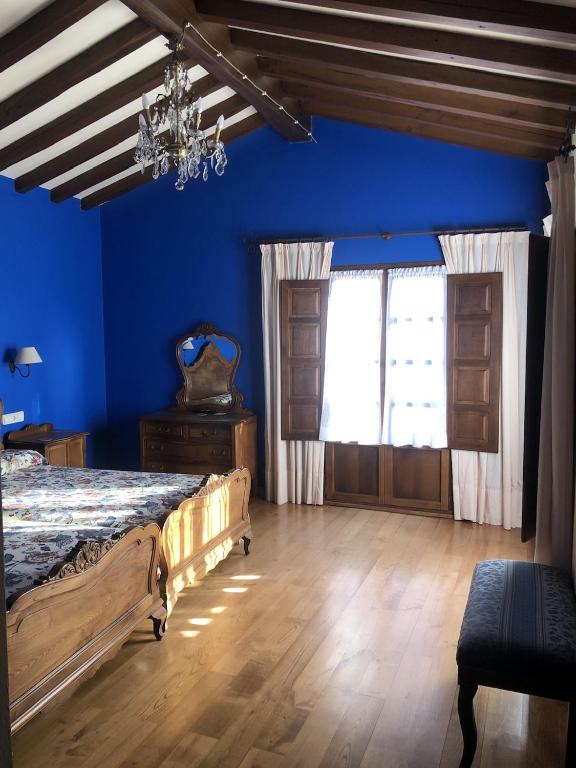 Postel nebo postele na pokoji v ubytování Casa Rural Trebol4Hojas