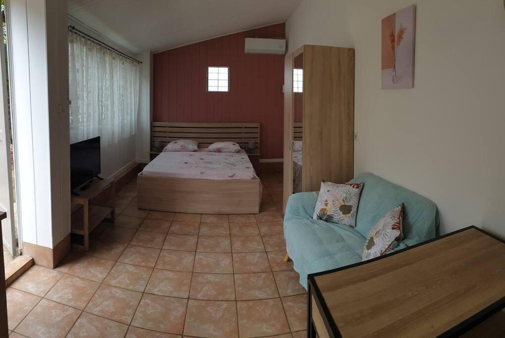 Postel nebo postele na pokoji v ubytování Ti Caz Emma