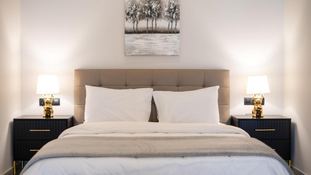 Postel nebo postele na pokoji v ubytování Tsikaris Boutique Guesthouse