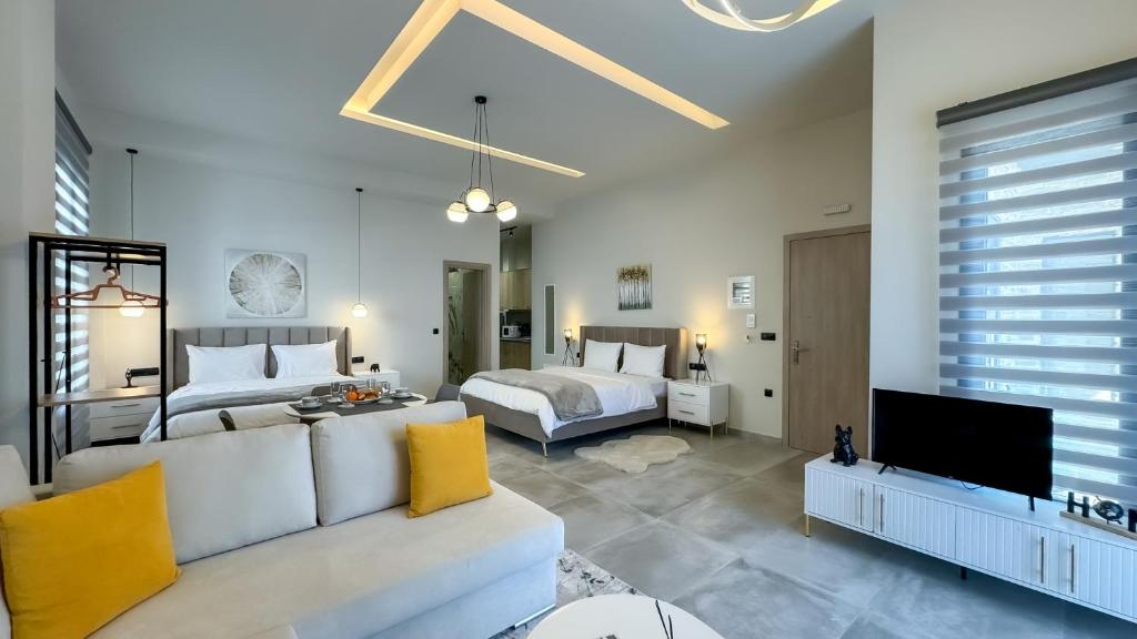 Postel nebo postele na pokoji v ubytování Tsikaris Boutique Guesthouse