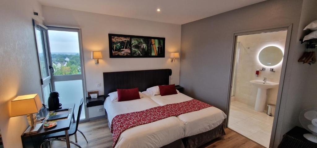 Postel nebo postele na pokoji v ubytování Hotel le Bellevue